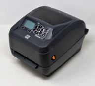 A pre-owned Zebra ZD5000 USB/Serial/Parallel/Ethernet 300dpi Desktop Thermal Label Printer (P/N: