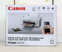 A boxed as new Canon Pixma TS3151 printer/scanner in white. (box damaged)