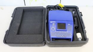 A pre-owned BMP71 Mobile Label Printer with battery pack, charger, label roll, software CD and