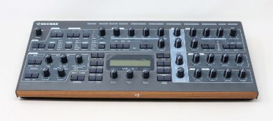 A boxed as new Access Virus TI 2 Desktop Synthesizer (Box opened, some damage to box).