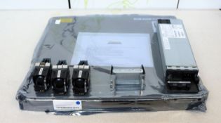 A refurbished Cisco Catalyst 3850 - 24 port network switch with C3850-NM-4-1G expansion module (