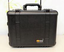 A pre-owned Pelican 1560 Flight Case (Removable foam insert in lower half).