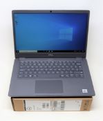 A pre-owned, boxed 14