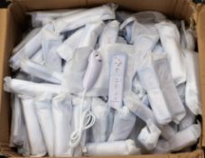 A large quantity of unbranded remote contolers for nintendo wii consoles in white.