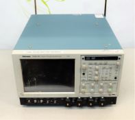 A pre-owned Tektronix TDS6124C Digital Storage Oscilloscope (Powers on, boots Windows XP and