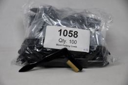 A large quantity of Tweezerman folding eyelash combs (Approximately 100 items).