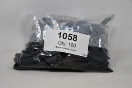 A large quantity of Tweezerman folding eyelash combs (Approximately 100 items).