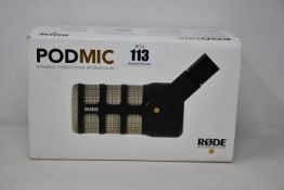 A Rode Podmic Dynamic Podcasting microphone.