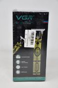 Four boxed as new VGR Voyager V-085 professional hair trimmers.