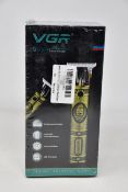 Four boxed as new VGR Voyager V-085 professional hair trimmers.