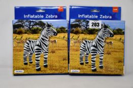 Seventeen boxed as new Folat inflatable zebras.