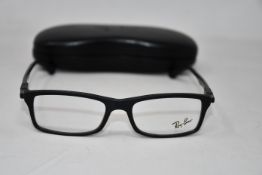 A pair of as new Ray Ban glasses frames.