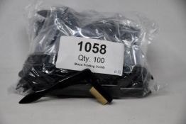 A large quantity of Tweezerman folding eyelash combs (Approximately 100 items).