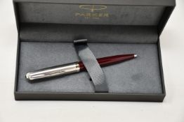 Four boxed as new Parker 51 ballpoint pens in Burgundy.