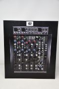 A boxed as new Solid State Logic SiX 6-channel analogue studio mixer.