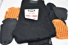 A pair of men's Resurgence Gear - Cafe Racer Slim Fit Selvedge Jeans in black (W32, L34).