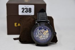 An as new Thomas Earnshaw Longcase automatic dial watch.