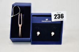 A pair of as new Swarovski pearl earrings (5559420) and a Swarovski Lifelong bangle (5390818).