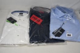 Three as new Hugo Boss shirts (2 x INT 43, 1 x INT XL).