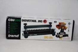 A boxed as new Trend CDJ300 Dovetail Jig.