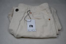 A pair of women's as new Raey relaxed trousers in white (UK 12) and a pair of Raey Boyfriend jeans