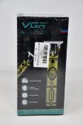 Four boxed as new VGR Voyager V-085 professional hair trimmers.