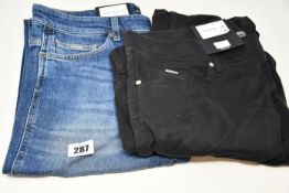 A pair of as new Hugo Boss jeans (W34/L30) and a pair of Hugo Boss stretch trousers in black (W38/
