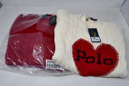 Two as new Ralph Lauren jumpers (L).
