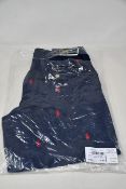 Four pairs of youths as new Ralph Lauren Polo Traveler shorts (All 14-16 years).