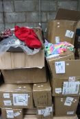 A pallet of miscellaneous items to include unicorn onesies, pet beds and household items.