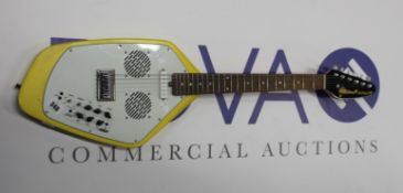 A pre-owned Vox Apache-2 electric guitar with built in speaker.
