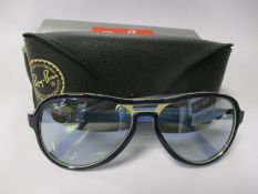 A pair of as new Ray Ban Vagabond sunglasses.