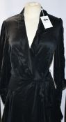 An as new Zimmermann silk wrap mini dress in black (UK 8).