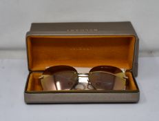 A pair of as new Bvlgari sunglasses.