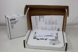 A boxed as new Welch Allyn Braun ThermoScan PRO 6000 ear thermometer with cradle.