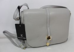 Four as new Renata Corsi handbags.