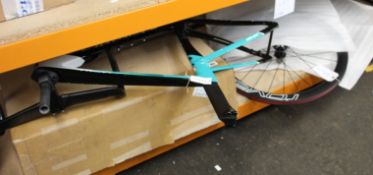 A gents as new carbon fibre 'Aero' racing bicycle frameset c/w handlebar and stem, carbon seat post,