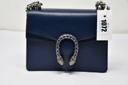 An as new Gucci Dionysus small handbag in navy with dust bag (RRP £1,600).