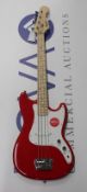 A Squire by Fender Affinity Bronco bass guitar in torino red.