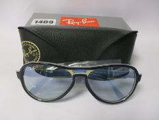 A pair of as new Ray Ban Vagabond sunglasses.