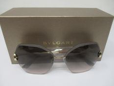 A pair of as new Bvlgari sunglasses.