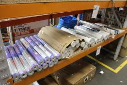 A miscellaneous assortment of wallpaper and related items (Approximately 40 rolls).