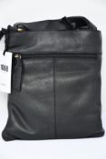 An as new Treats Kamma Common leather bag in black.