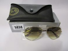 A pair of as new Ray Ban Aviator large metal sunglasses.