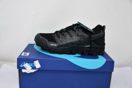A pair of women's as new Asics Gel-FujiTrabuco 7 G-TX trainers (UK 8.5).