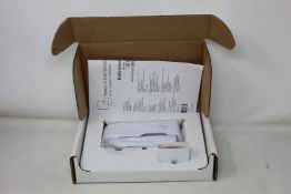 A boxed as new Welch Allyn Braun ThermoScan PRO 6000 ear thermometer with cradle.