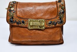 An as new small Campomaggi brown leather bag.