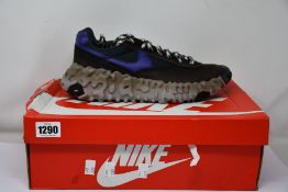 A pair of as new Nike Overbreak SP (UK 9.5).