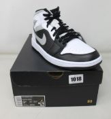 A pair of as new Nike Air Jordan 1 Mid (UK 8.5).