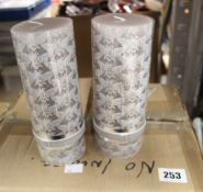 Sixteen Lene Bjerre decorative pillar candles in pure cashmere.